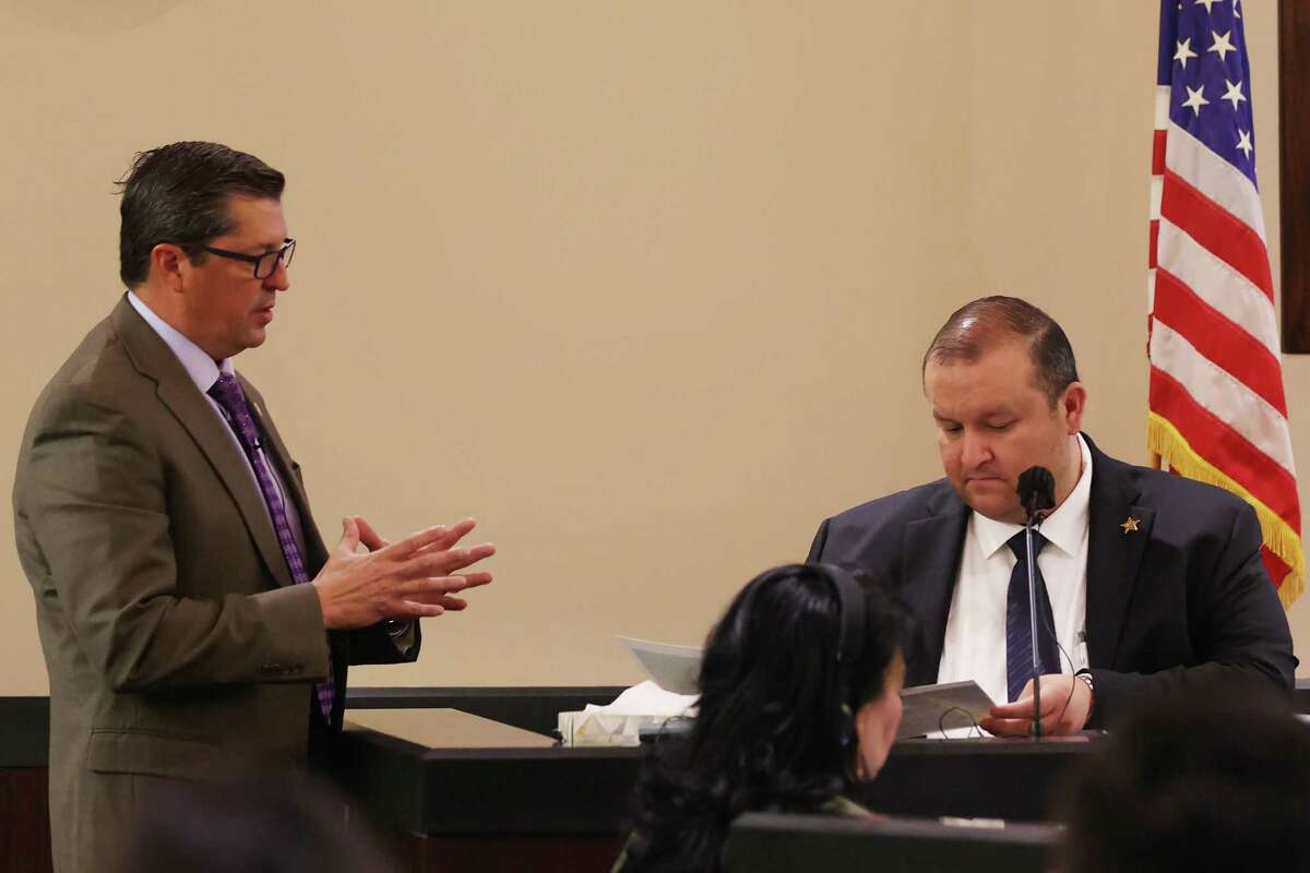 Webb County District Attorney Isidro R. “Chilo” Alaniz, left, questions Webb County Sheriff’s Capt. Federico Calderon during the capital murder trial of former U.S. Border Patrol supervisor Juan David Ortiz on Friday. Ortiz is accused of killing four women in Laredo in September 2018.