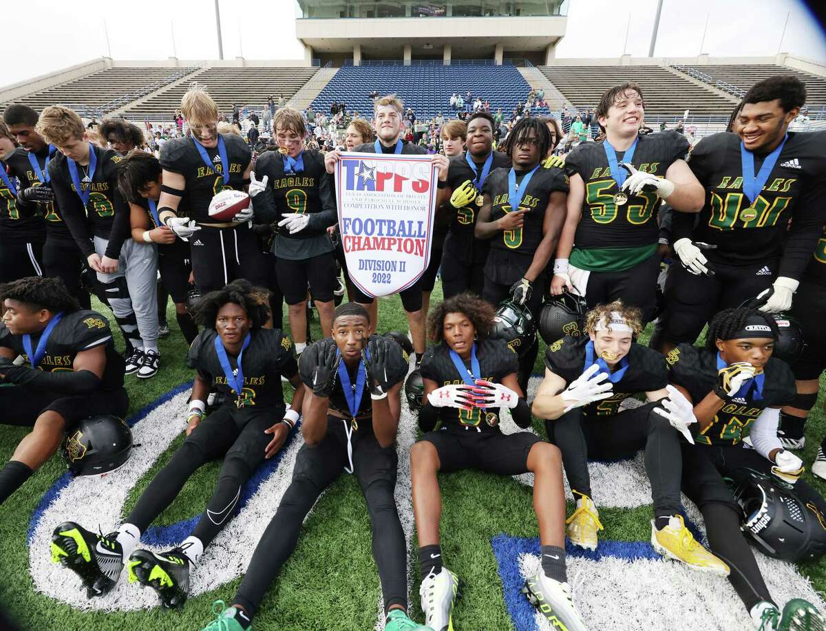 Members of the Fort Bend Christian Academy pose after defeating All Saints Episcopal School at the TAPPS Division II state championship, Friday, Dec. 2, 2022, in Waco, Texas.