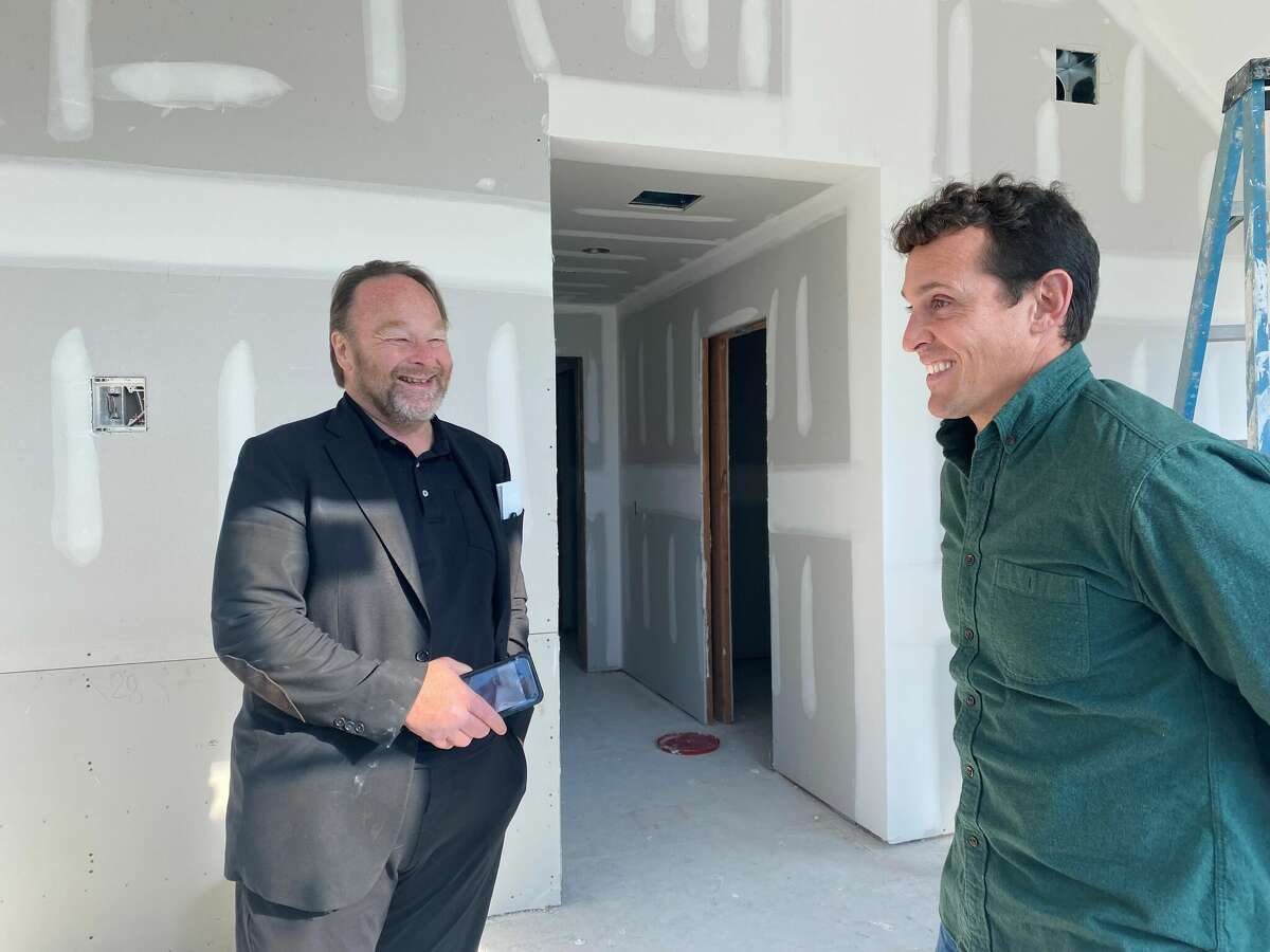 Architect Duo Dickinson and developer Adam Greenberg inside one of the units at the new General's Residence in November 2022.