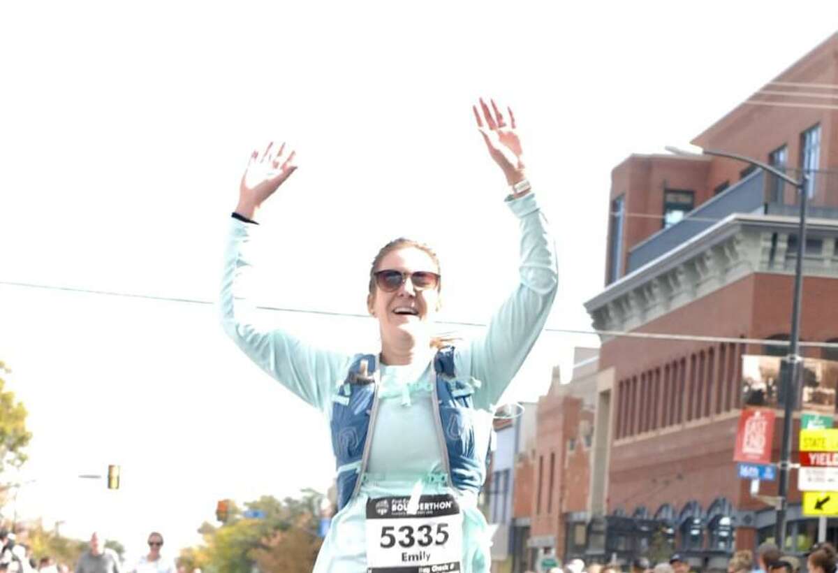 Emily Harmsen approaches the finish line at the Boulderthon half marathon race in Boulder, Colo. in October 2021. The Austin resident is will participate in Rock 'n' Roll San Antonio Marathon on Sunday, nearly a year after recovering from an accident that left her with head, back and rib injuries.