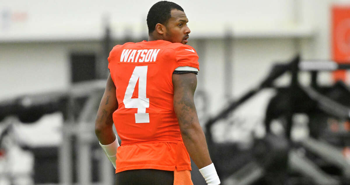 Cleveland Browns quarterback Deshaun Watson stands on the field during an NFL football practice at the team's training facility Wednesday, Nov. 30, 2022, in Berea, Ohio. (AP Photo/David Richard)