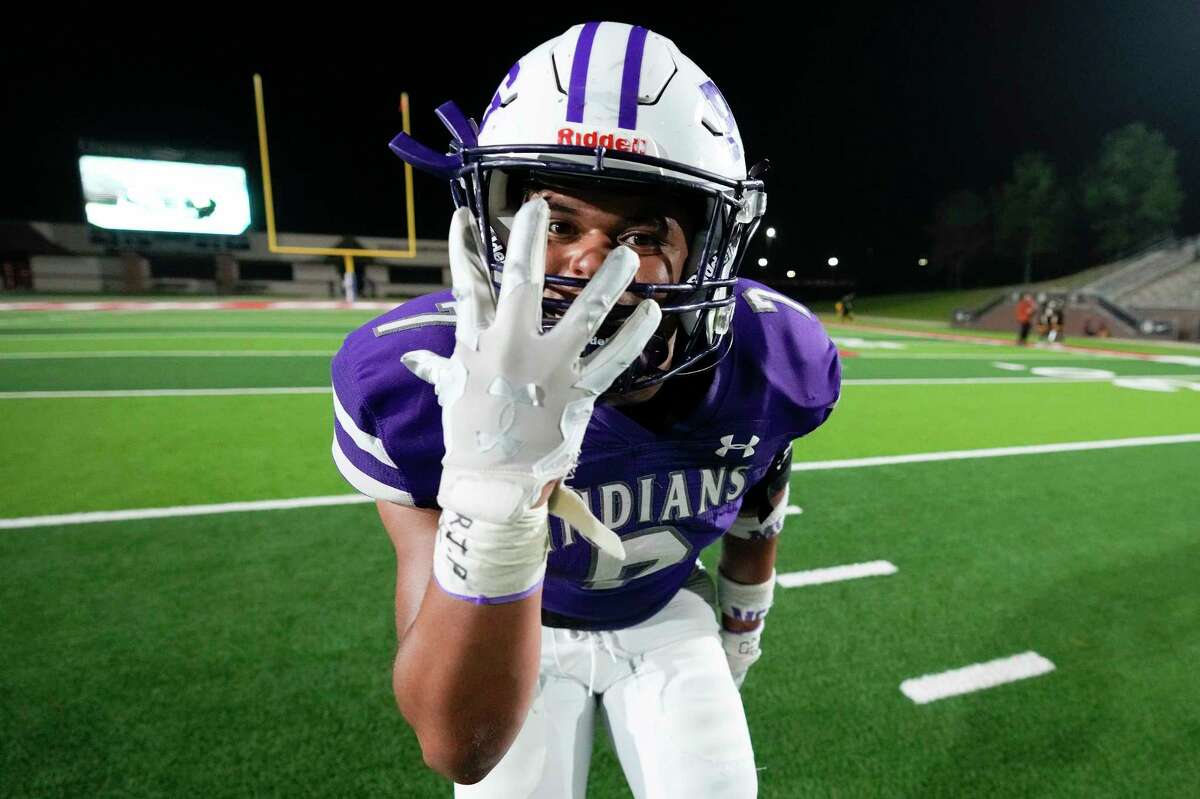 Port Neches-Groves’ Alfredo Torres displays “five” signifying five wins to get to the state championship after the team’s win over Fort Bend Marshall in the Region III-5A Division II championship high school football playoff game, Friday, Dec. 2, 2022, in Houston. Port Neches-Groves has won four games in the playoffs, and will play in a state semifinal next weekend with a state berth on the line.