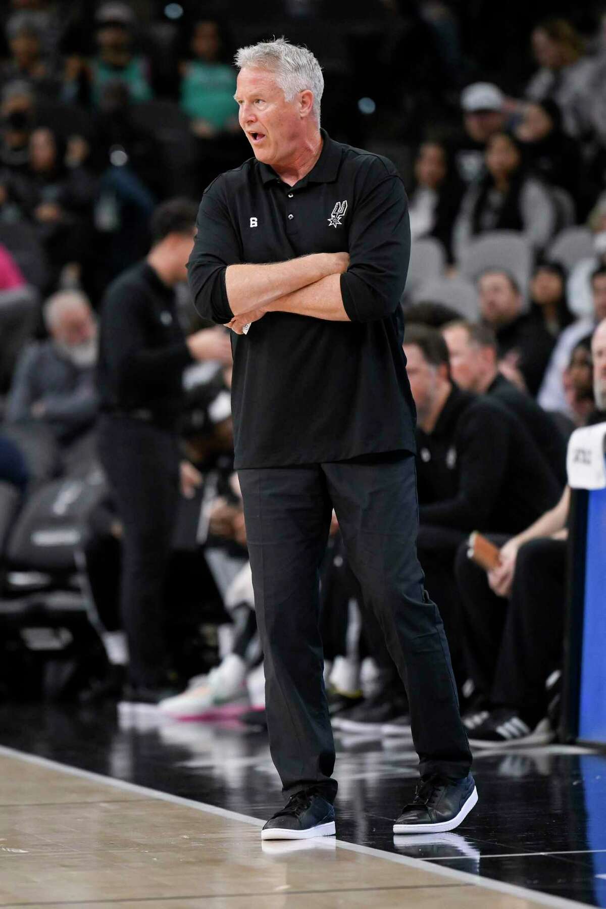 San Antonio Spurs assistant coach Brett Brown yells to his players during the first half of an NBA basketball game against the New Orleans Pelicans, Friday, Dec. 2, 2022, in San Antonio. (AP Photo/Darren Abate)