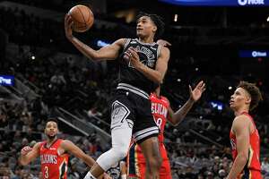 While others eye lottery, Spurs focus on development