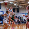 Meridian's Josie Barriger takes it strong to the rim during Friday's game against Clare, Dec. 2, 2022.
