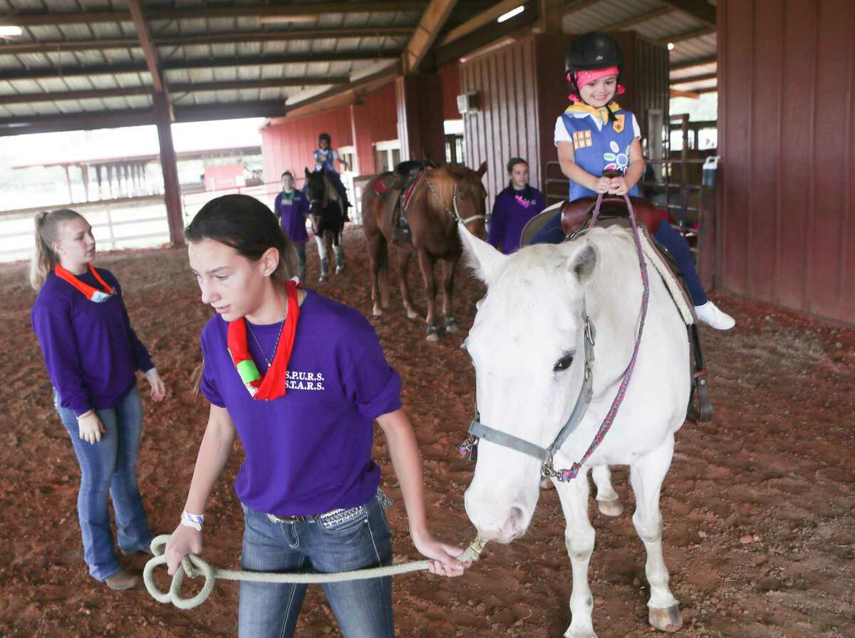 Girl Scouts celebrate 100th anniversary at Conroe camp