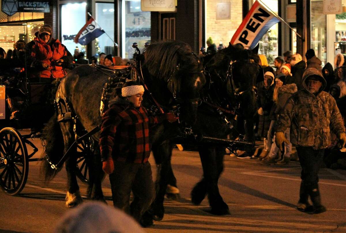 Manistee's Sleighbell Parade goes down River Street