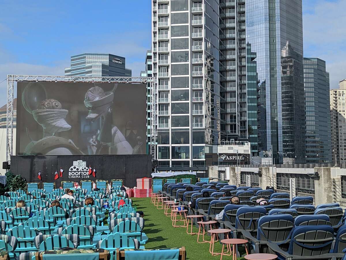 High-rises provide the backdrop for watching a movie at Rooftop Cinema Club