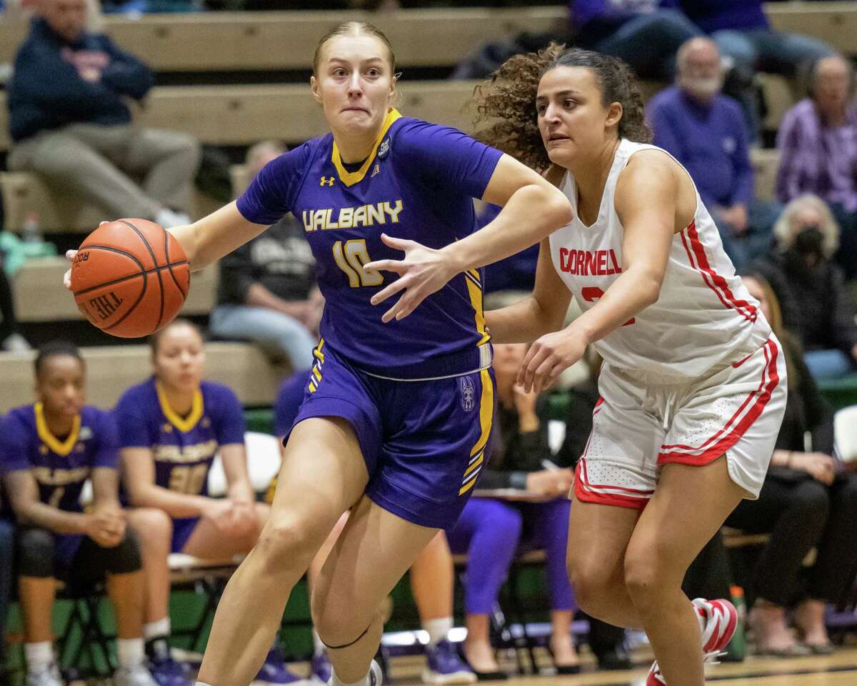 UAlbany graduate student Ellen Hahne drives to the basket in front of Cornell freshman Vivienne Knee during a non-league game on Saturday, Dec. 3, 2022, at Hudson Valley Community College in Troy, NY. (Jim Franco/Times Union)