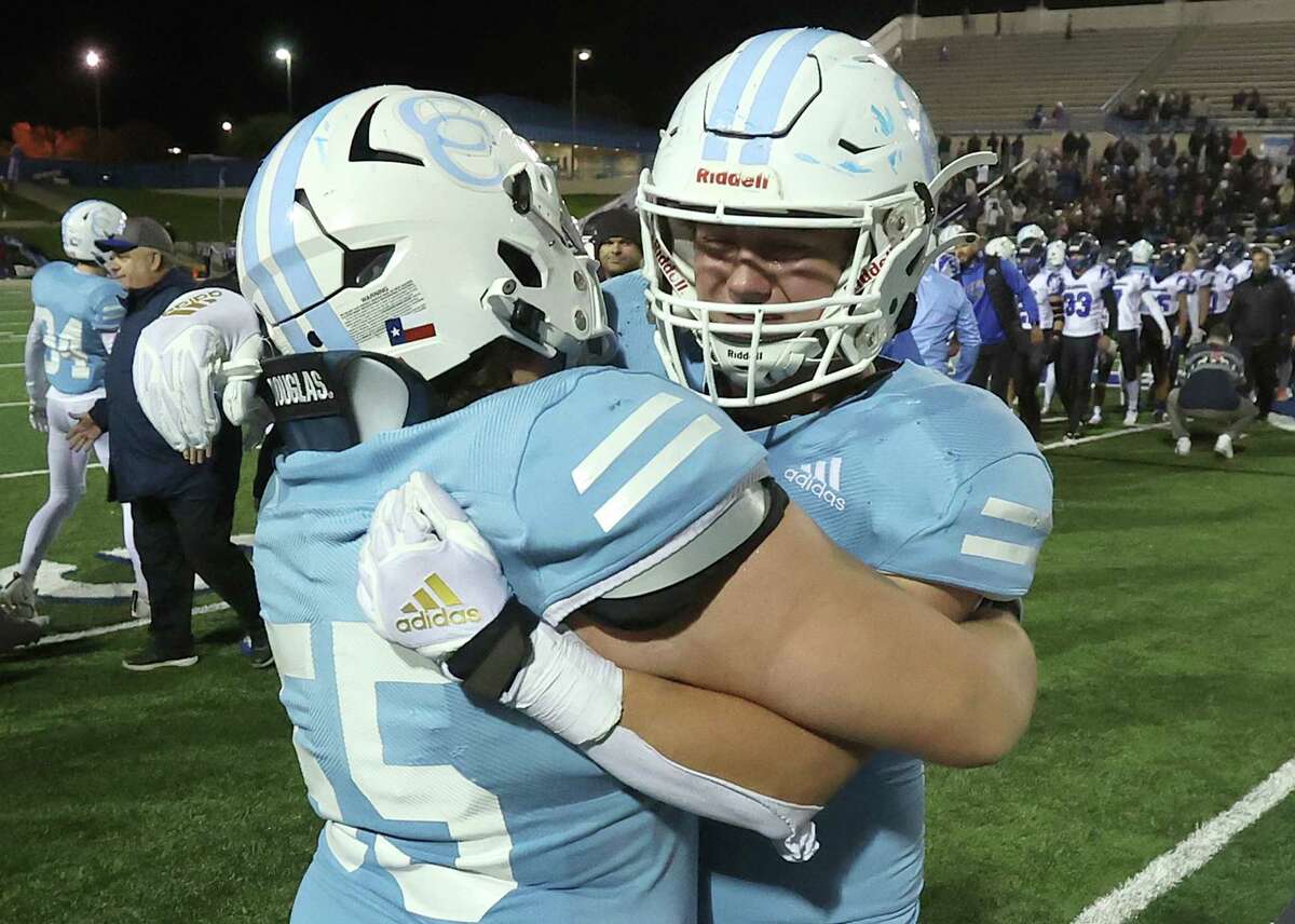 Cypress Christian Zeke Hogan (55) and Cypress Christian Preston Hamrick (7) consol each other after loosing 24-0 to Dallas Christian in the TAPPS Division III state football championship, Sat. Dec. 3, 2022, in Waco, Texas.