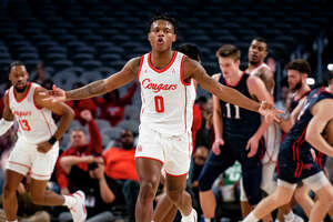 No. 1 UH holds off Saint Mary's