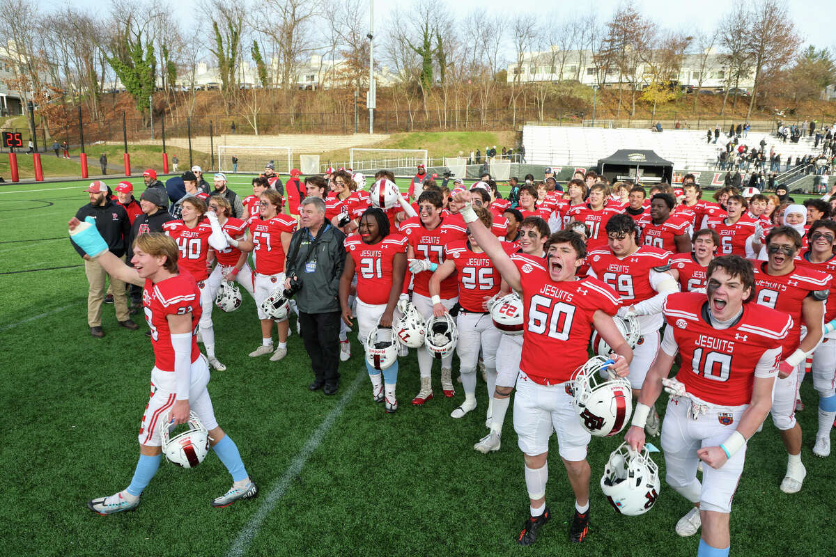 Members of the Fairfield  Prep football team celebrate after defeating Trumbull in the CIAC Class LL semifinals Sunday, Nov. 4, 2022.