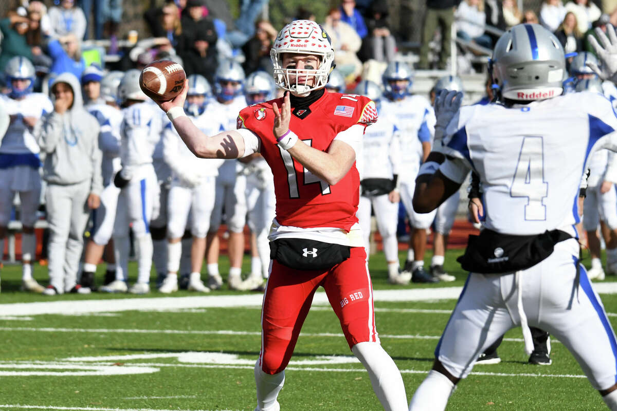 Greenwich's Jack Wilson throws a touchdown pass during the Class LL football semifinals between Greenwich and Glastonbury at Cardinal Stadium, Greeniwch on Sunday, Dec. 4, 2022.