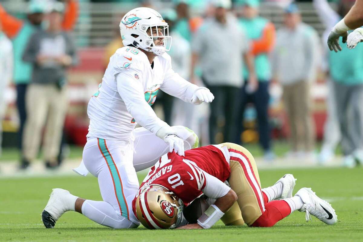 Jimmy Garoppolo was injured on the 49ers’ first drive Sunday after getting sacked by two Dolphins linebackers.