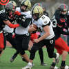 Cole Peterson of Barlow runs through a huge hole. Peterson had 212 yards rushing,