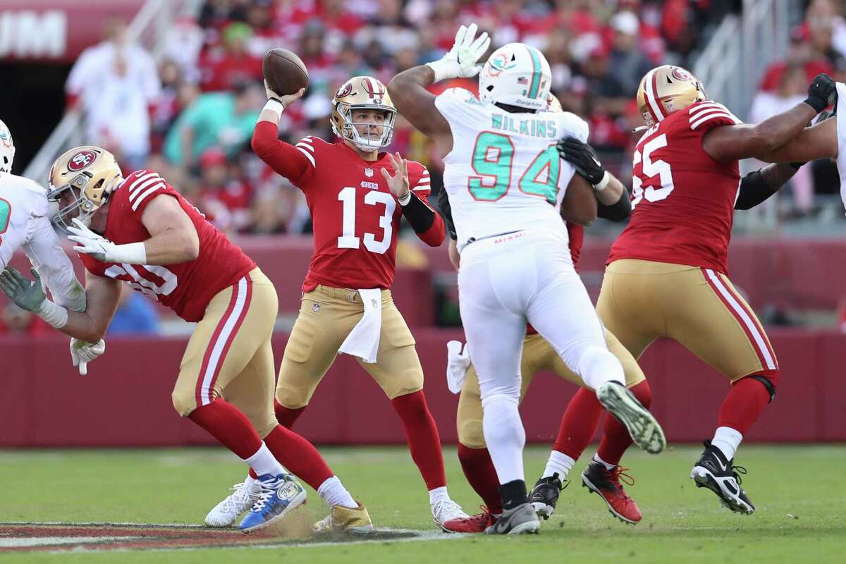 San Francisco 49ers’ Brock Purdy passes against Miami Dolphins during Niners’ 33-17 win in NFL game at Levi’s Stadium in Santa Clara, Calif., on Sunday, December 4, 2022.