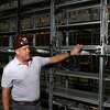 Whinstone US CEO Chad Harris points to where Bitcoin mining machines will go during a tour at the Whinstone US Bitcoin mining facility in Rockdale, Texas, on October 10, 2021.