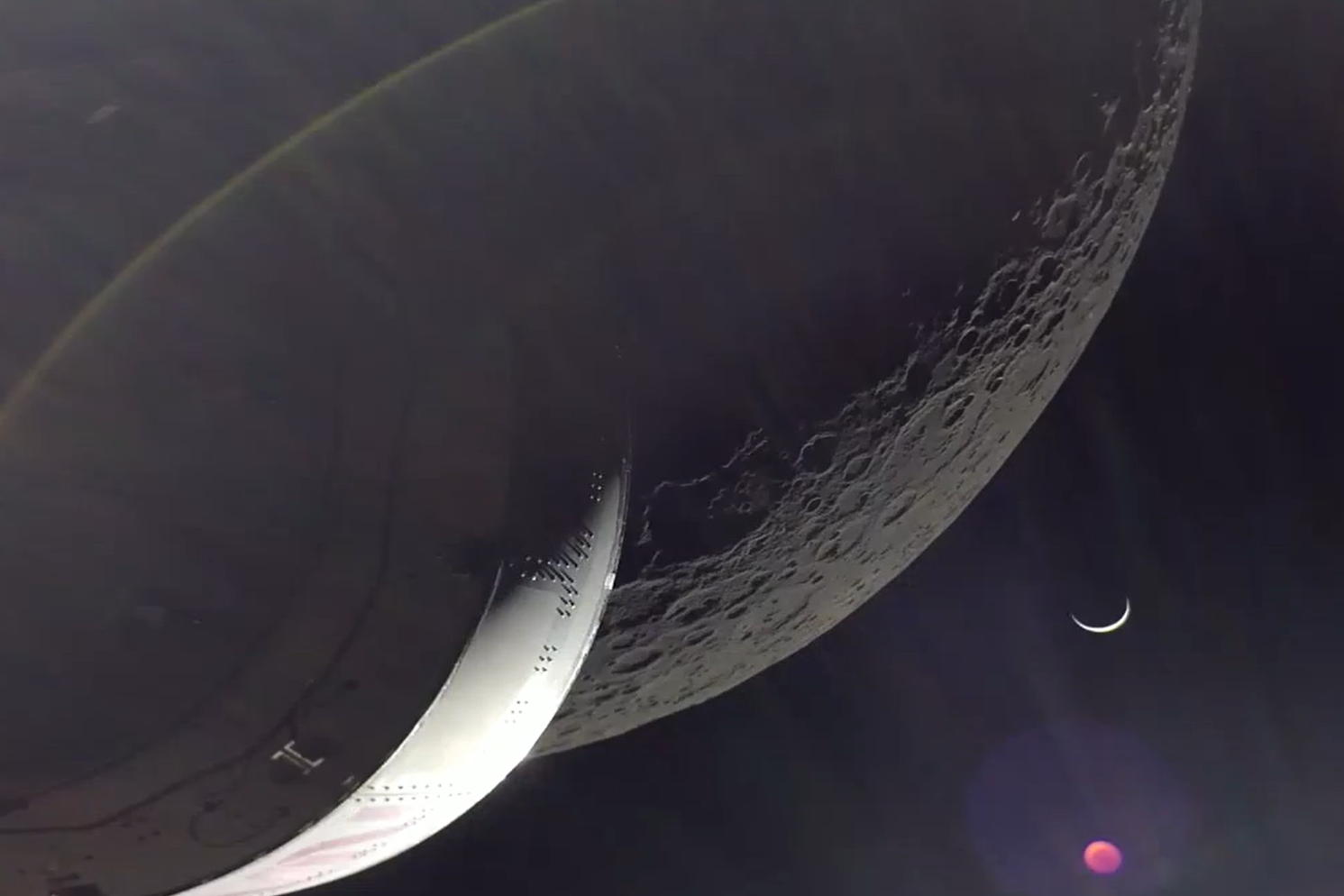 Orion spacecraft captures images of spectacular 'crescent Earth'