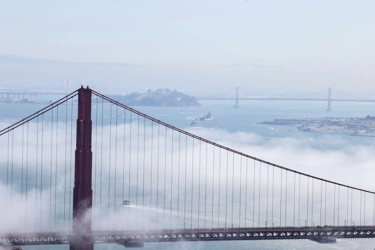 The Golden Gate Bridge is seen with fog during Fleet Week in San Francisco on Oct. 7, 2022. 