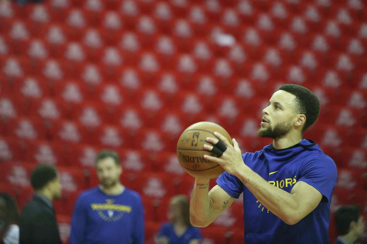 Steph Curry of the Golden State Warriors takes shots before a game in a 2019 photo.