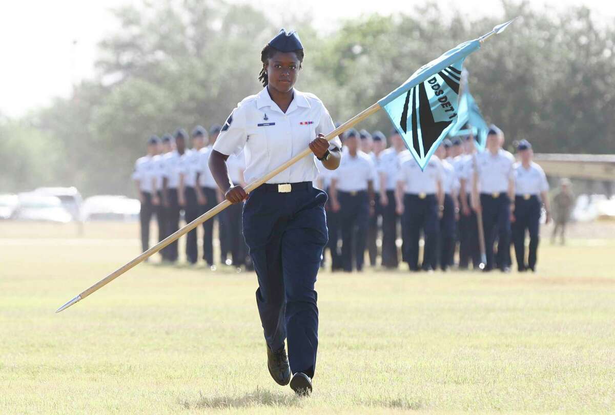 A United States Space Force graduate runs with her detachment flag during a graduation ceremony this summer. A bipartisan group of lawmakers has called on DOD to restore funding for service members’ housing stipends. We agree with the effort.