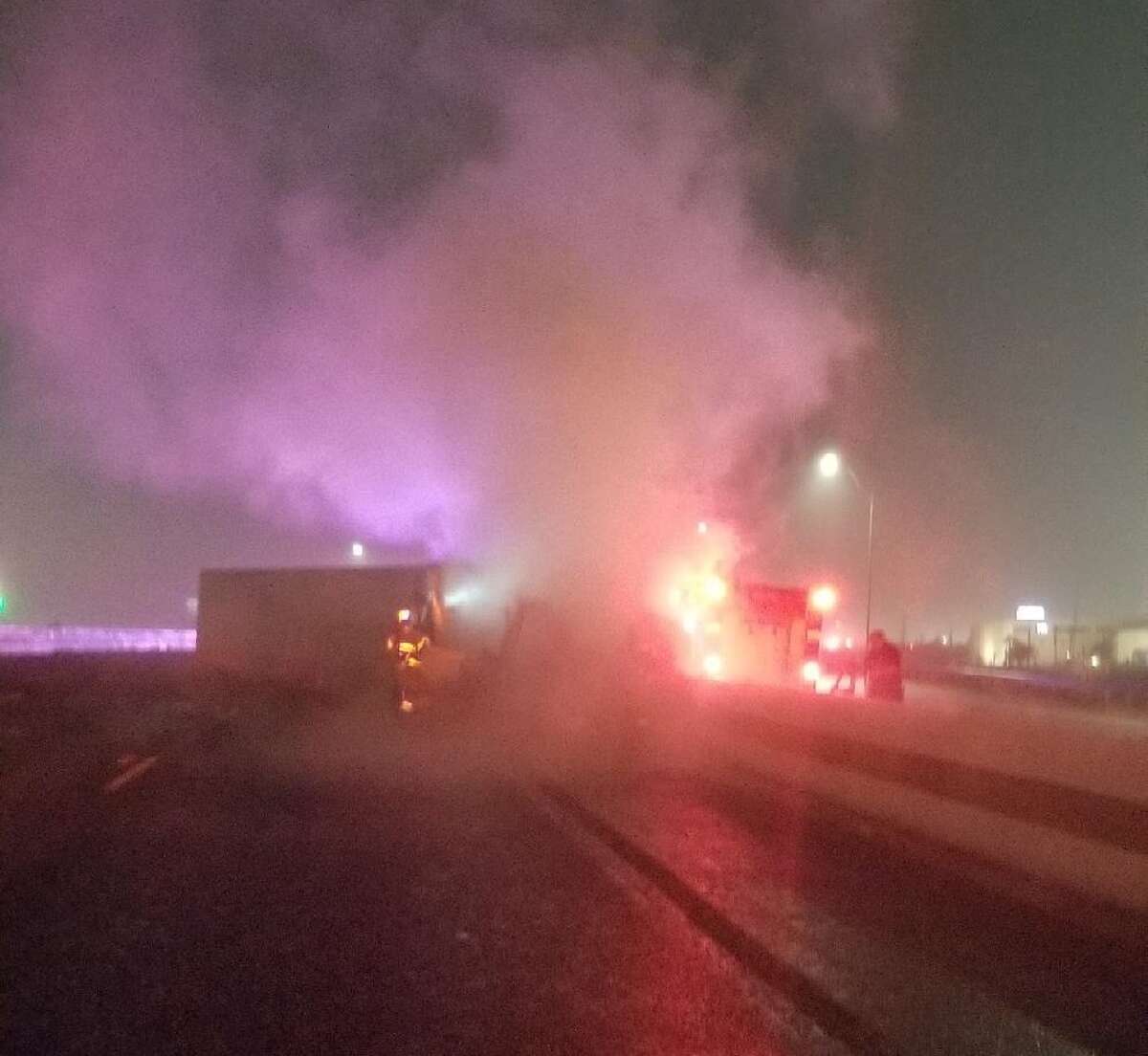 A tractor-trailer was discovered on its side and in flames in Laredo on mile marker 13 of Interstate 35 on Sunday, Dec. 4, 2022.