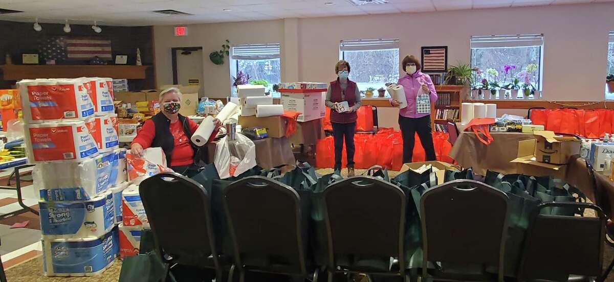 Volunteers go through donations for Benzie Senior Resources' holiday bags in 2021. The organization has once again teamed up with area churches to send out bags to homebound seniors.