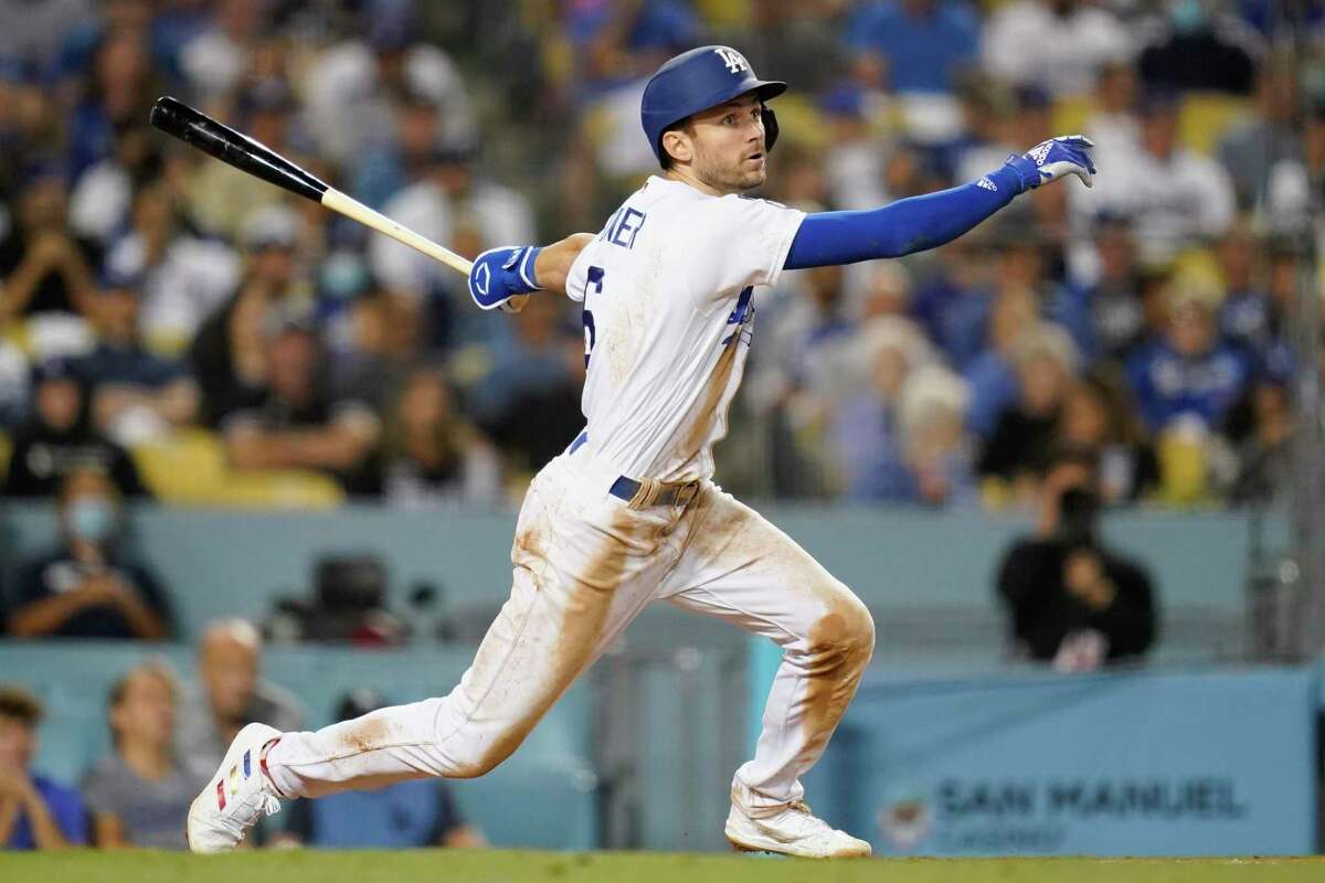 FILE - Los Angeles Dodgers' Trea Turner (6) bats during a baseball game against the New York Mets Thursday, Aug 19, 2021, in Los Angeles. The Philadelphia Phillies landed Trea Turner on Monday, Dec. 5, 2022, agreeing to a $300 million, 11-year contract with the dynamic shortstop. (AP Photo/Ashley Landis, File)