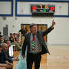 Meridian coach Mitch Bohn shouts out a play during Monday's game against Ogemaw Heights, Dec. 5, 2022.