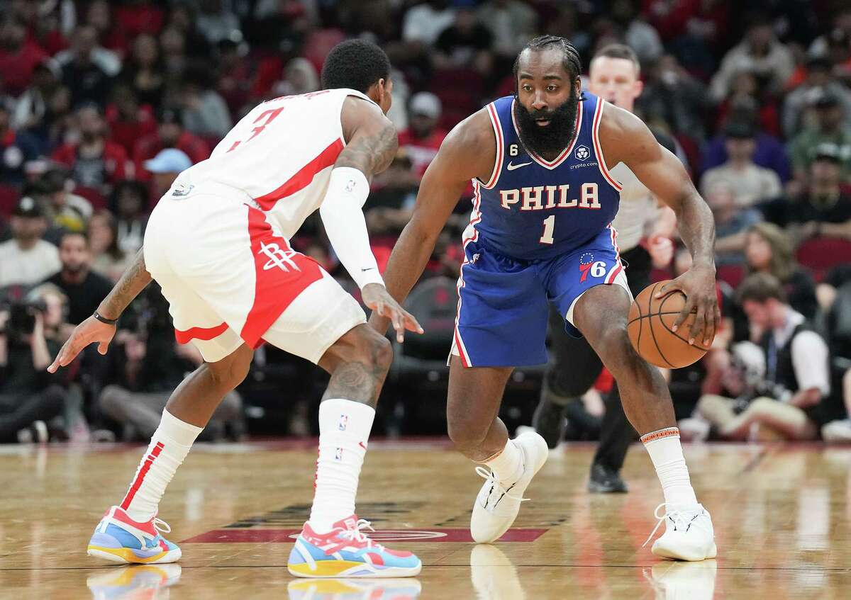 Philadelphia 76ers guard James Harden (1) drives the ball against Houston Rockets guard Kevin Porter Jr. (3) in the second half at the Toyota Center on Monday, Dec. 5, 2022 in Houston. Houston Rockets won the game in double overtime 132-123.