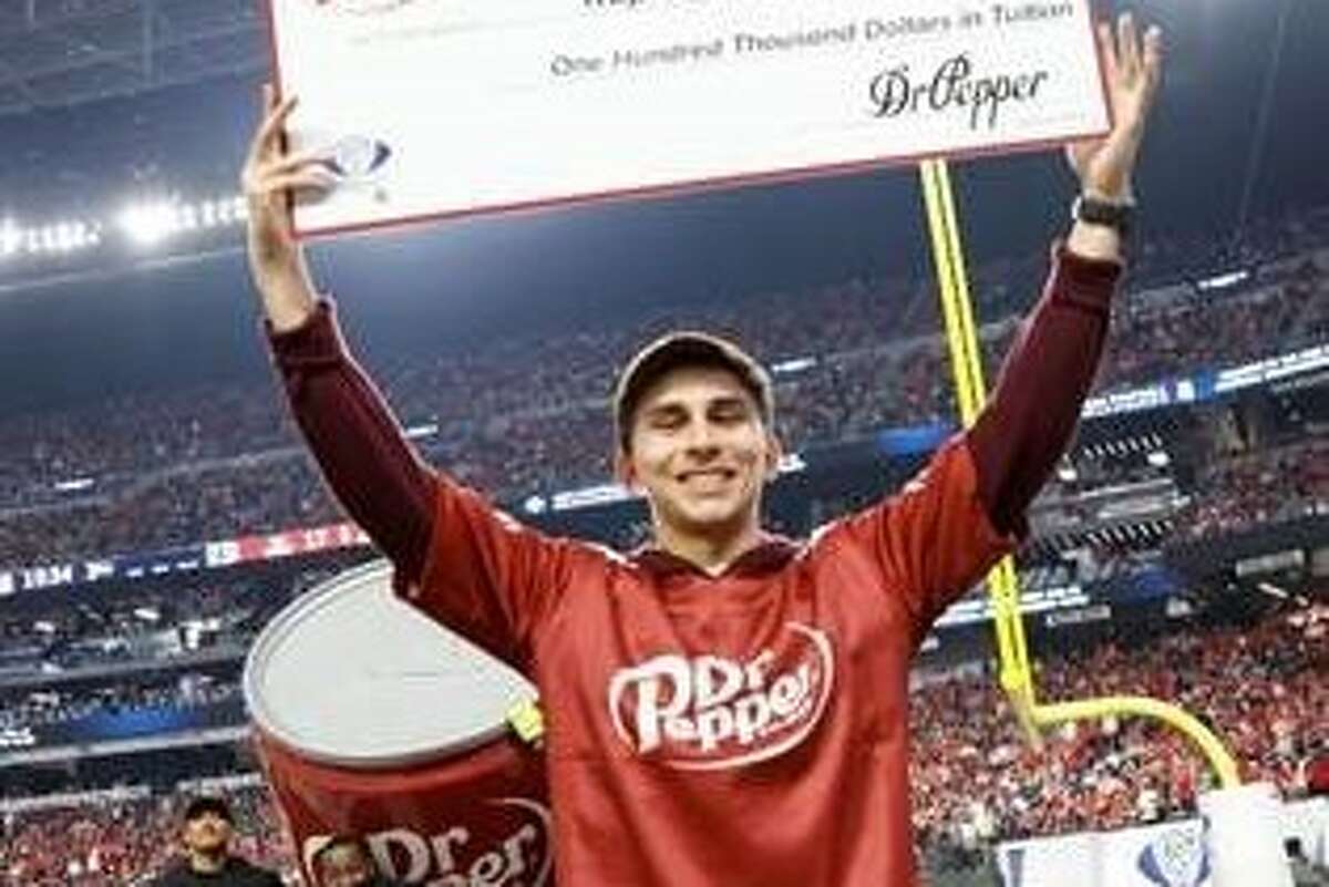 Raphael Idrogo, 20, won $100,000 in tuition for winning the Dr Pepper Conference Championship toss on Friday, Dec. 2, 2022.