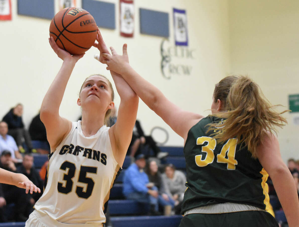 Father McGivney's Sophia Ivnik had six points, seven rebounds and three steals in a quarterfinal win over Pinckneyville on Wednesday in the Christ Our Rock Winterfest in Centralia.