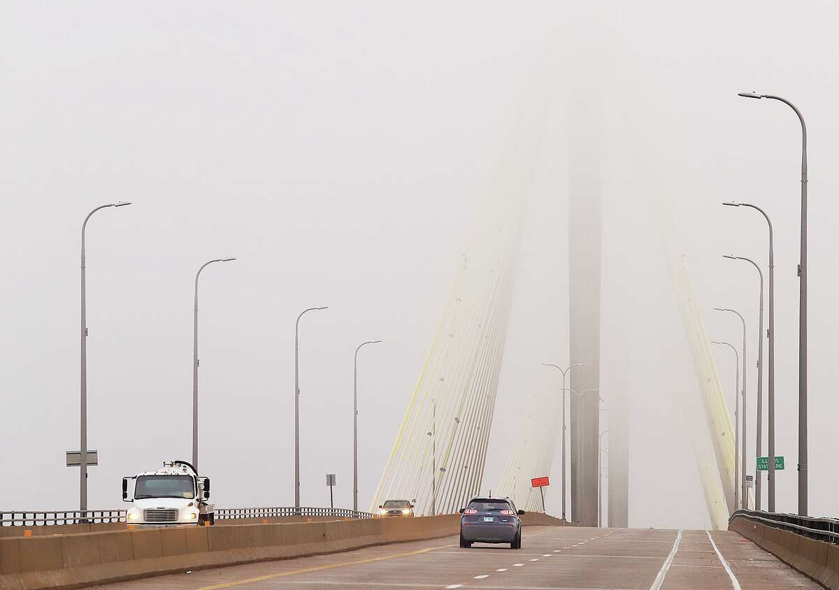 John Badman|The Telegraph The Riverbend woke to heavy fog Tuesday morning, masking the top of the Clark Bridge where the upper part of the support piers weren't visible until you were right under them. The fog shrouded most of the St. Louis area and didn't lift until nearly noon. Daily high temperatures are expected to remain near 50 degrees through the weekend. For additional photos of the fog, visit thetelegraph.com.