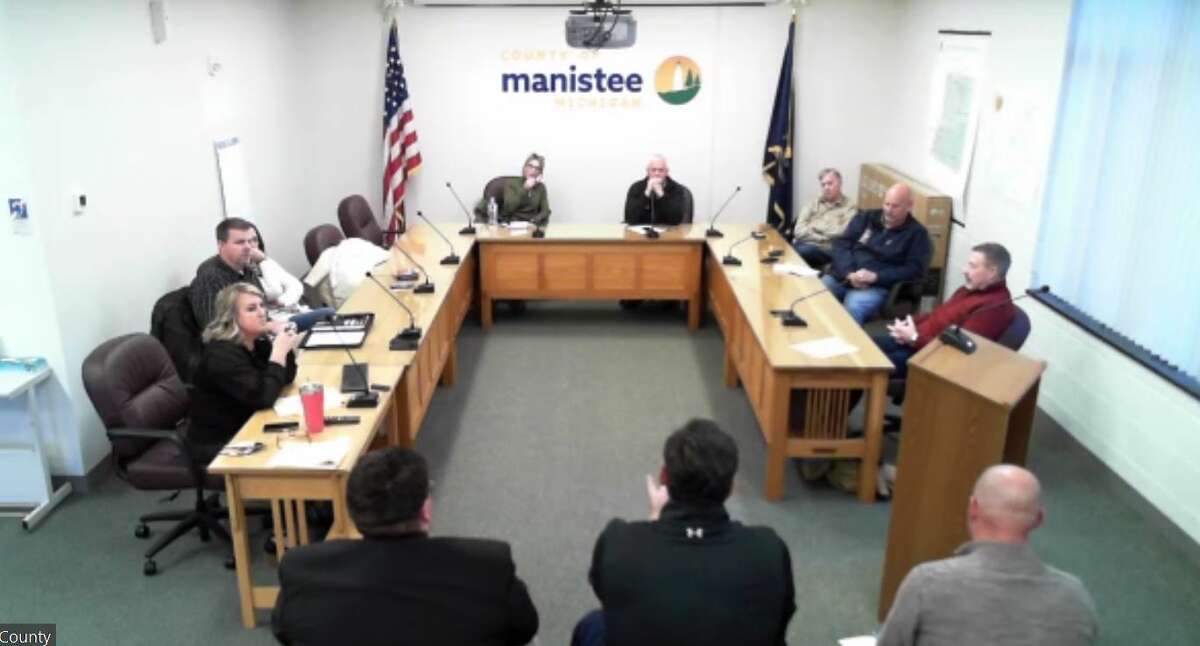 State and local officials meet with members of the Manistee County Board of Commissioners to discuss the possible decommissioning of Tippy Dam in Brethren.