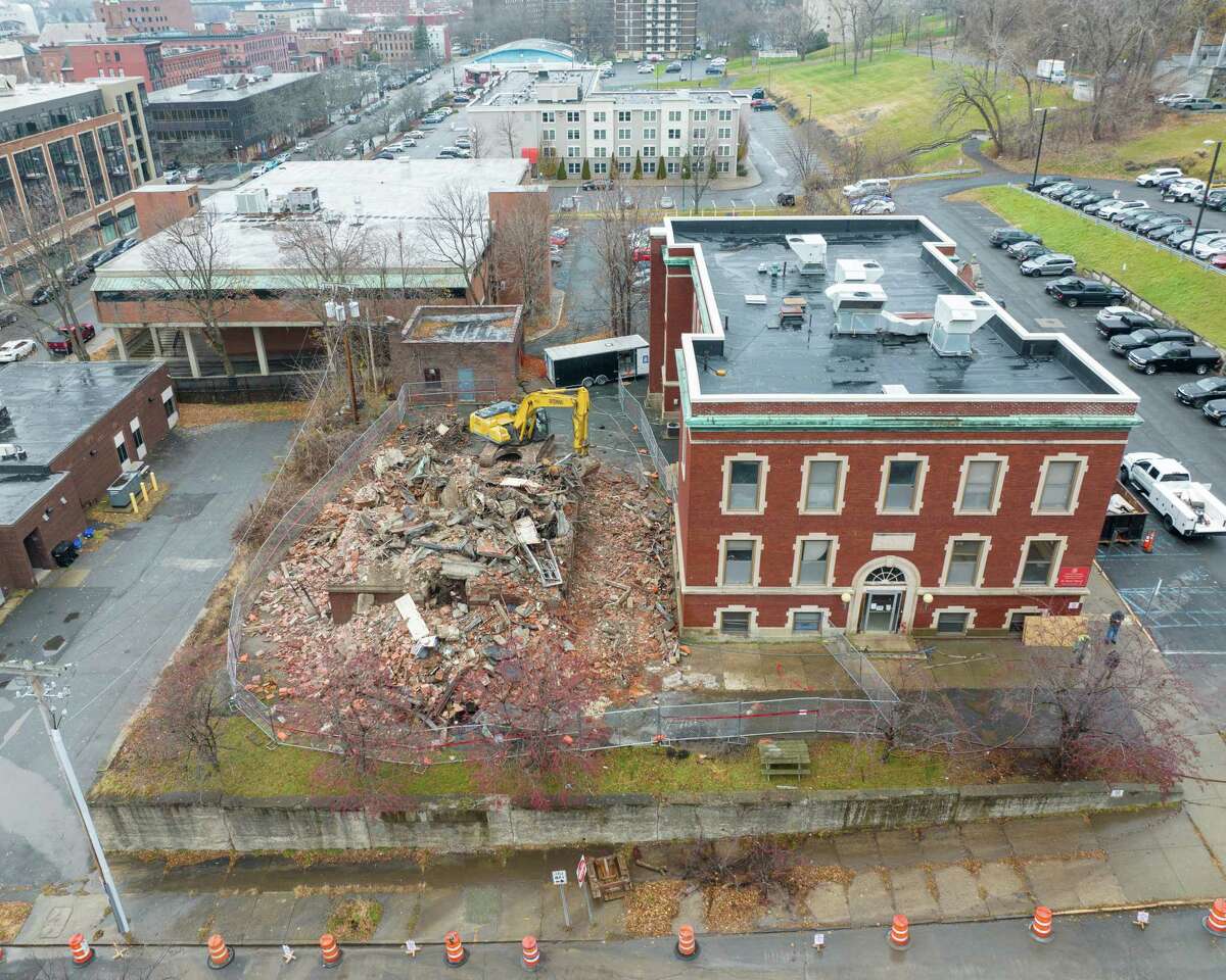 The Fire Alarm Telegraph and Police Signaling Building was demolished on Tuesday, Dec. 6, 2022, at 67 State St. in Troy, NY. (Jim Franco/Times Union)