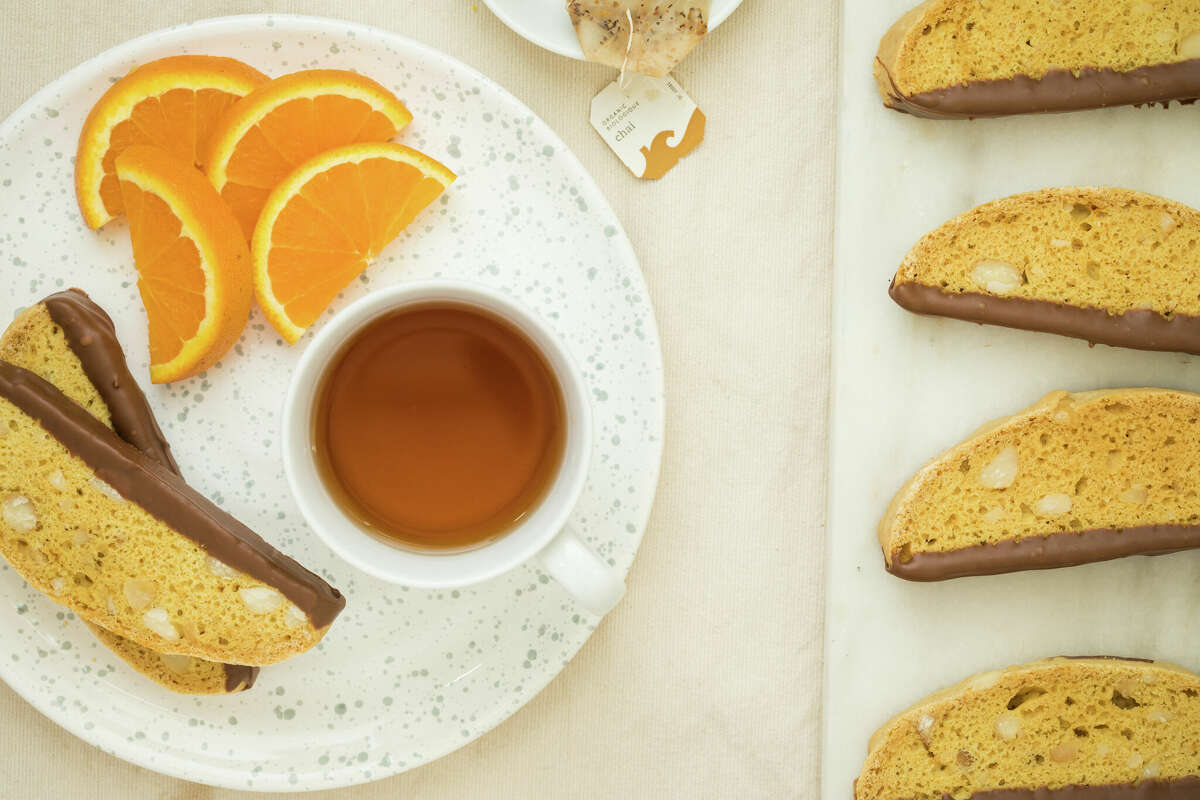 Orange, Chocolate and Macadamia Nut Biscotti can be paired with wine for a bright addition to any holiday party.