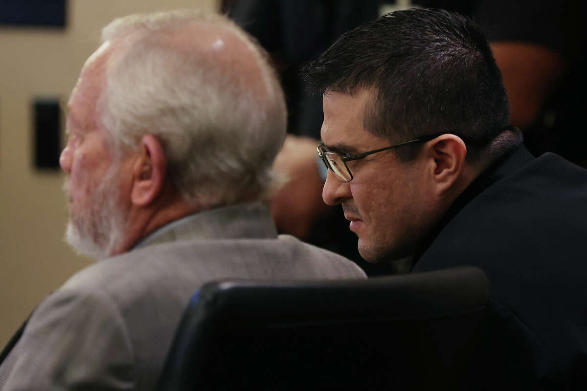 Former U.S. Border Patrol supervisor Juan David Ortiz, right, sits with one of his defense attorneys, Raymond Fuchs, during his capital murder trial at the Cadena-Reeves Justice Center in San Antonio, Texas, Tuesday, Dec. 6, 2022. Ortiz is accused in the murders of four women in September 2018. He is facing life without the possibility of parole if found guilty. The trial was moved from Laredo to San Antonio due to publicity.