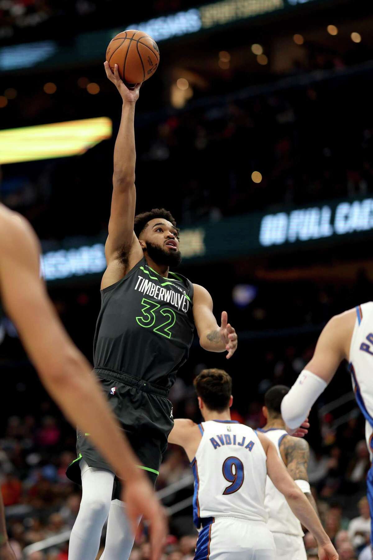 WASHINGTON, DC - NOVEMBER 28: Karl-Anthony Towns #32 of the Minnesota Timberwolves puts up a shot against the Washington Wizards in the first half at Capital One Arena on November 28, 2022 in Washington, DC. NOTE TO USER: User expressly acknowledges and agrees that, by downloading and or using this photograph, User is consenting to the terms and conditions of the Getty Images License Agreement. (Photo by Rob Carr/Getty Images)