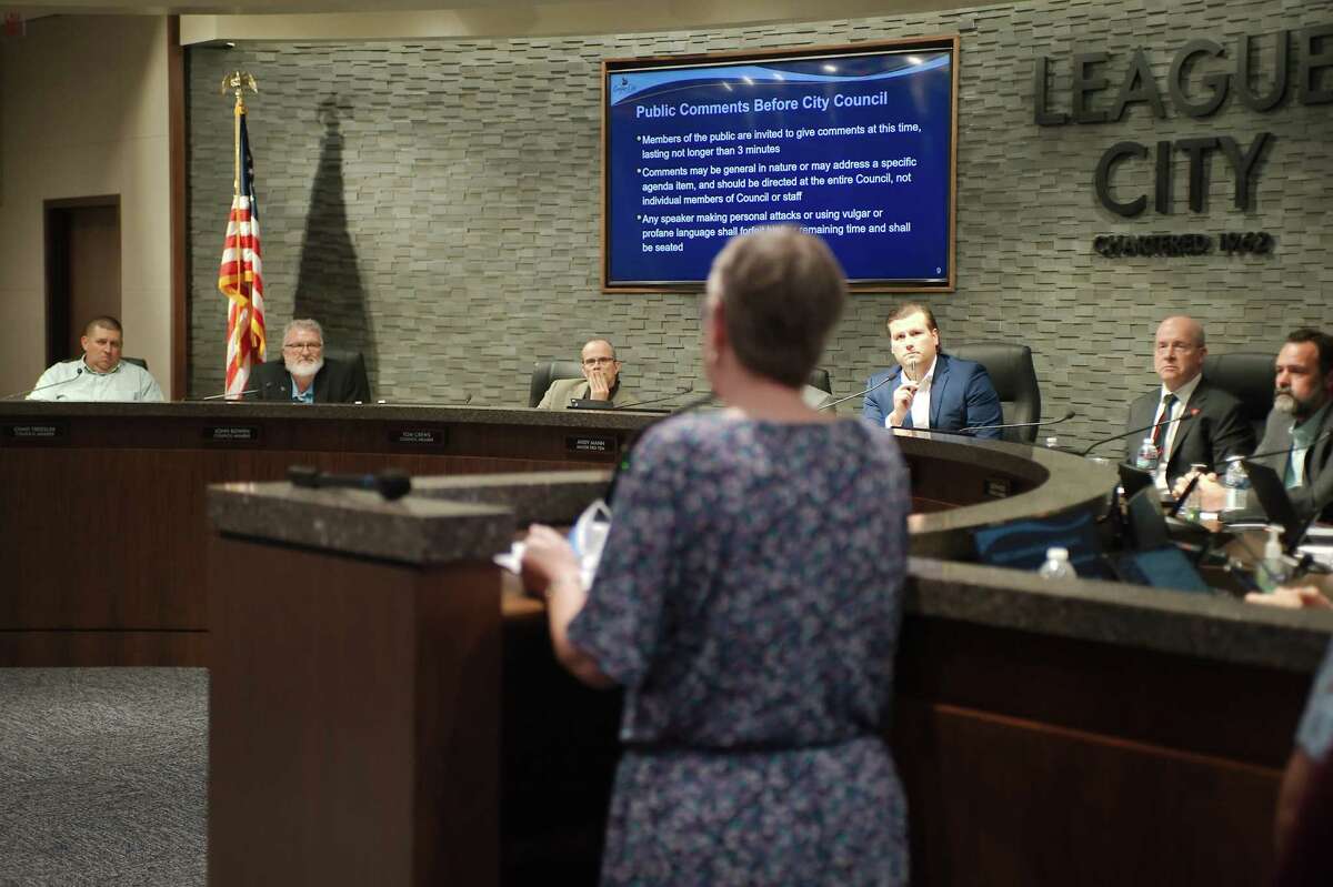 League City City Council members listen, Tuesday, Dec. 6,2022, as Peggy Levy express her opposition to a proposal that denies use of city tax dollars to purchase books for the library on subjects that include gender identity, sexual orientation and related topics.