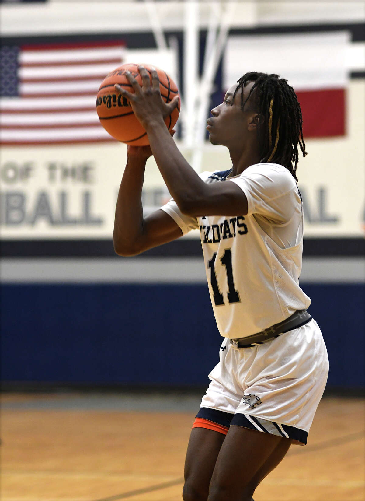 Tomball Memorial senior shooting guard Cory O'Bryant sets for a shot against Cy Ranch during the first quarter of their matchup at TMHS on Dec. 6, 2022.