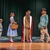 Rebekah Toner, Baylor Schillinger, Charliee Phelps, and Ari DeShano play Dorothy, the Tin Man, the Cowardly Lion, and the Scarecrow respectively.