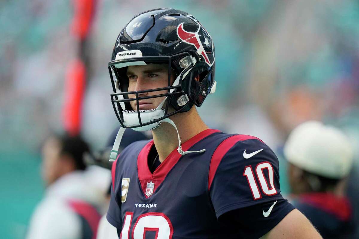 Houston Texans quarterback Davis Mills (10) stands on the sidelines during the second half of an NFL football game against the Miami Dolphins, Sunday, Nov. 27, 2022, in Miami Gardens, Fla.