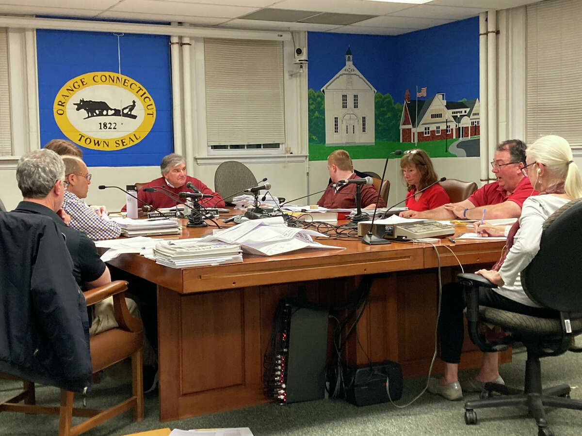 Members of the Orange Town Plan and Zoning Commission discuss an application for a cannabis retailer on Boston Post Road at the board's Dec. 6 meeting.