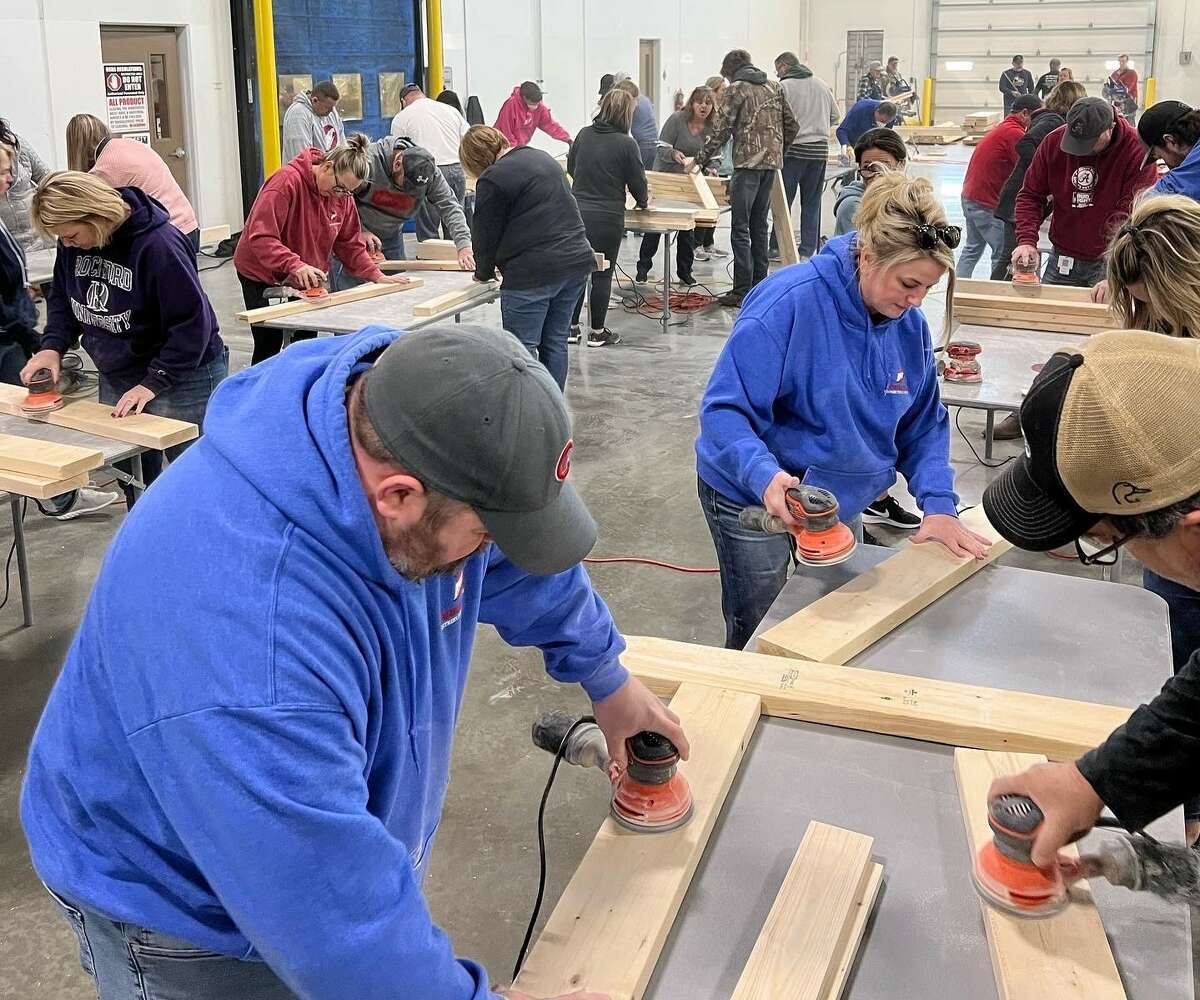 Donnewald Distributing in Greenville partnered with Sleep in Heavenly Peace on Dec. 3 to build beds for children who would otherwise not have one. The company has committed to creating 30 beds.