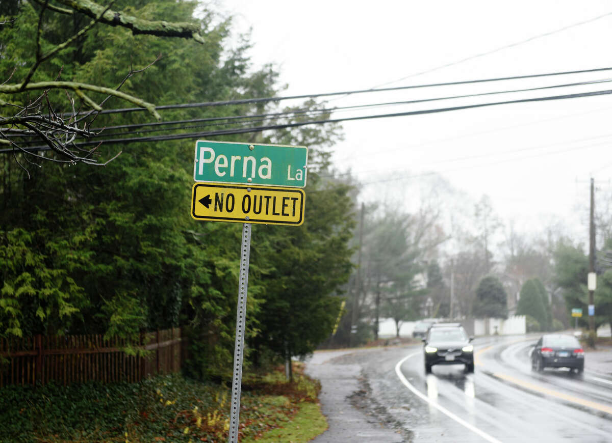 A sign for Perna Lane in Stamford, Conn., photographed on Wednesday, Dec. 7, 2022. Properties in the neighborhood of Perna Lane have failing septic systems. The first phase of a sewer project will involve properties on the east side of High Ridge Road between Perna Lane and the Merritt Parkway.