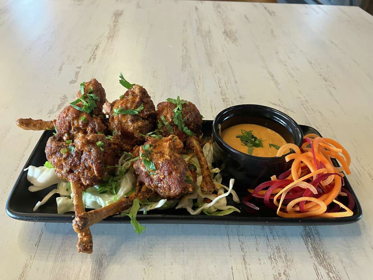 An entree of chicken lollipops is served at Veedu on Dec. 7, 2022, the day of the Indian restaurant's grand opening at 337 East Wackerly in Midland.