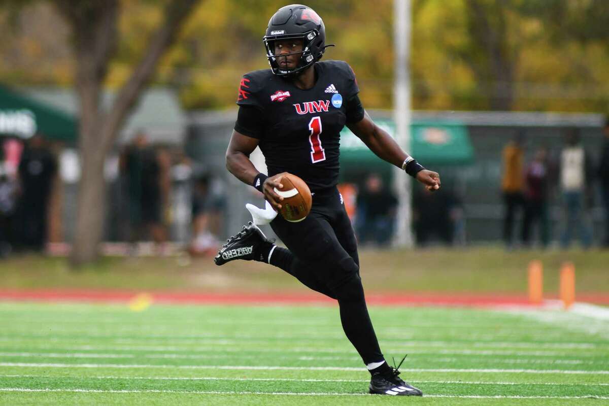 Incarnate Word quarterback Lindsey Scott Jr. (1) rolls out of the pocket during the second quarter of Saturday’s NCAA playoff game against Furman at Tom Benson Stadium.