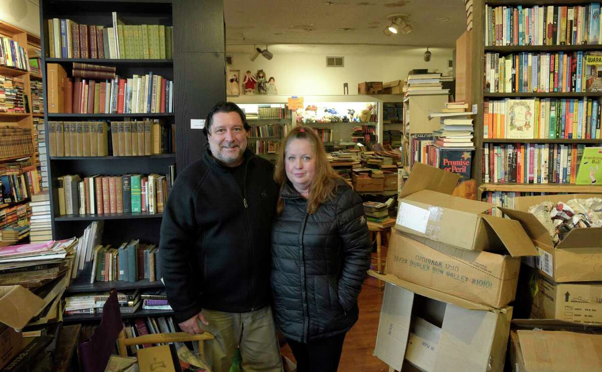 Nikko Dalessio and Kathy Murphy of Windy Cats Estate Sales which is handling the liquidation sale of Relay Bookhouse in Bethel, Conn. Owner Joel Orton recently died. Wednesday, December 7, 2022.