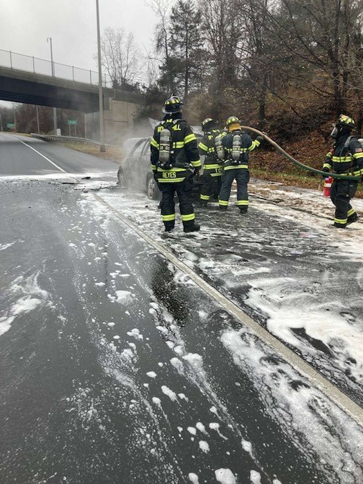 Firefighters closed two travel lanes on I-91 southbound Wednesday morning as they worked to extinguish a car fire that destroyed a Ford SUV, according to Rocky Hill Fire Chief Michael P. Garrahy.