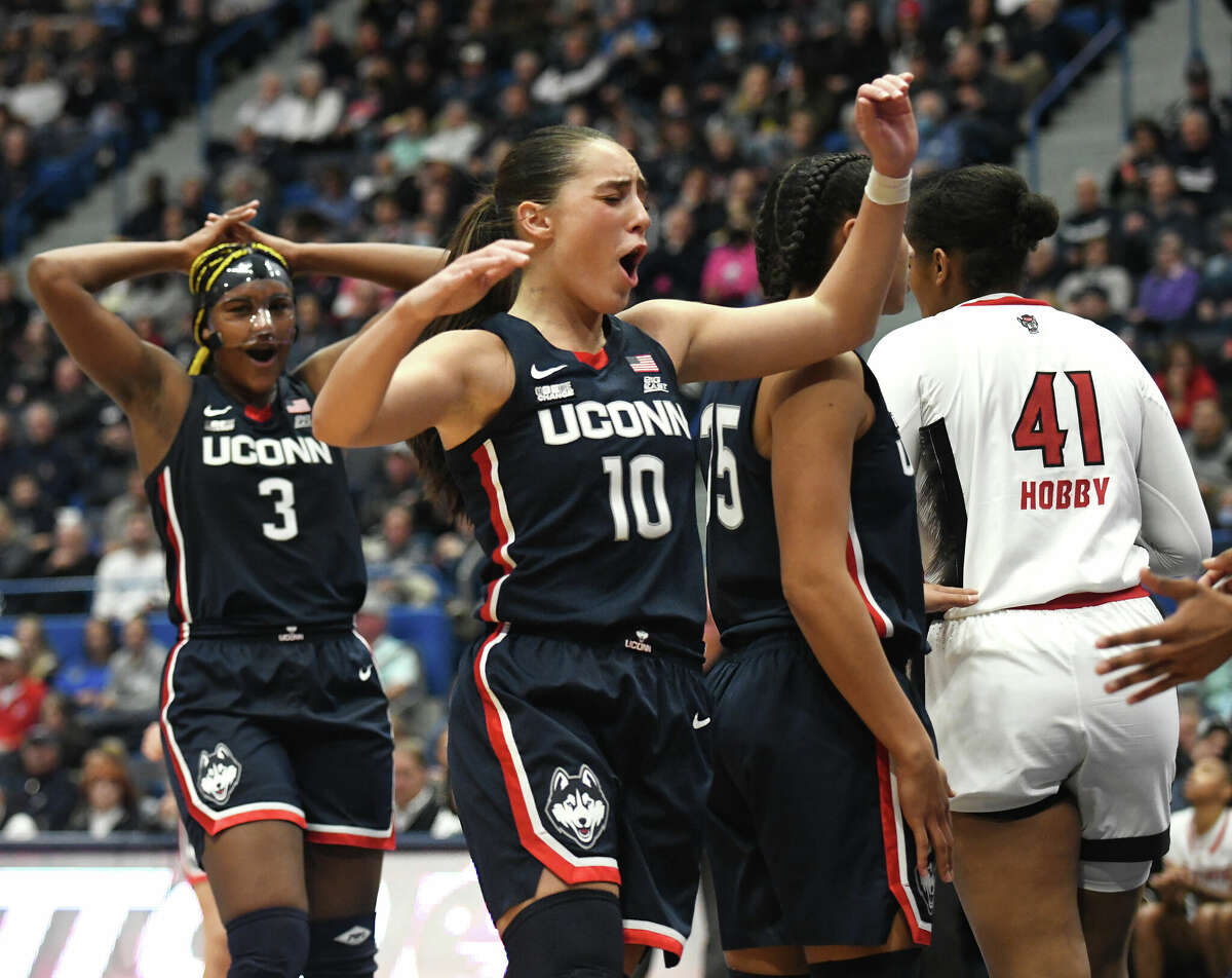 UConn guard Nika Muhl (10) celebrates in No. 5 UConn's 91-69 win over No. 10 NC State in the NCAA women's college basketball game at the XL Center in Hartford, Conn. Sunday, Nov. 20, 2022.